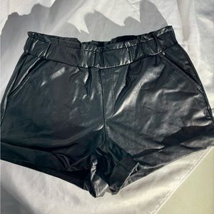 Black leather shorts with ribbed shaping waist